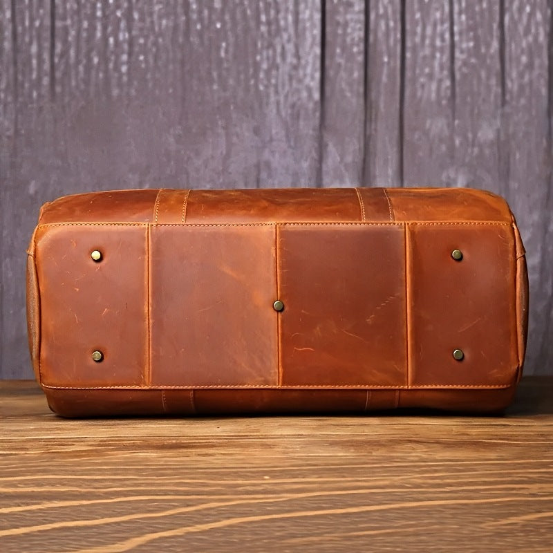 horizon leather carry mens brown leather travel duffel bag showcasing brass toned metal rivets on the base