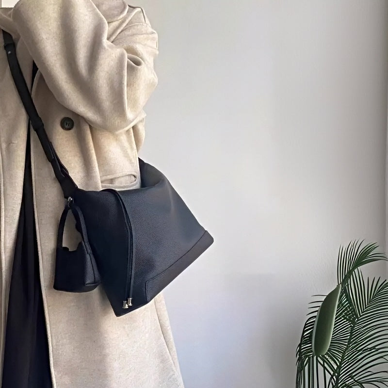 Metro Leather Hobo black crossbody bag for women, pebble leather texture, silver hardware, crossbody carry style