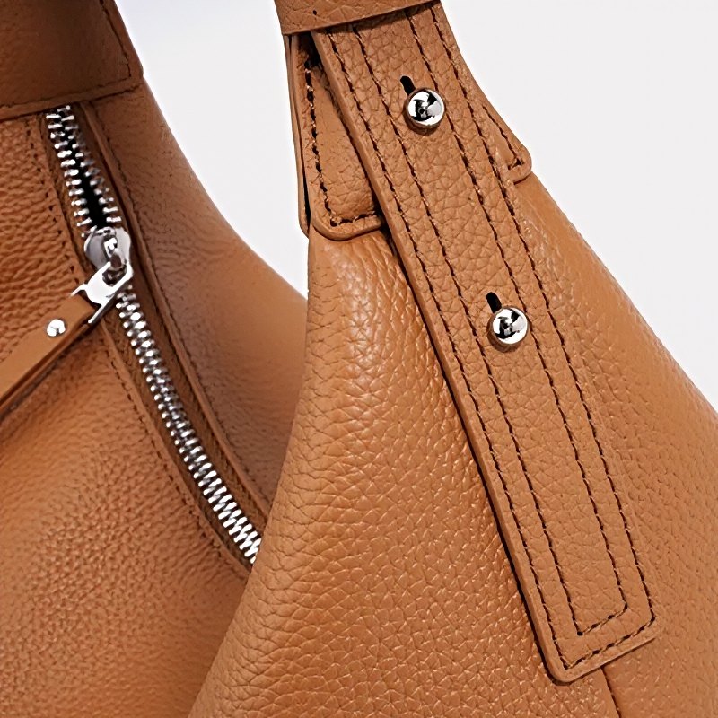 Metro Leather Hobo women’s shoulder bag in tan pebbled leather with silver zipper and strap detail