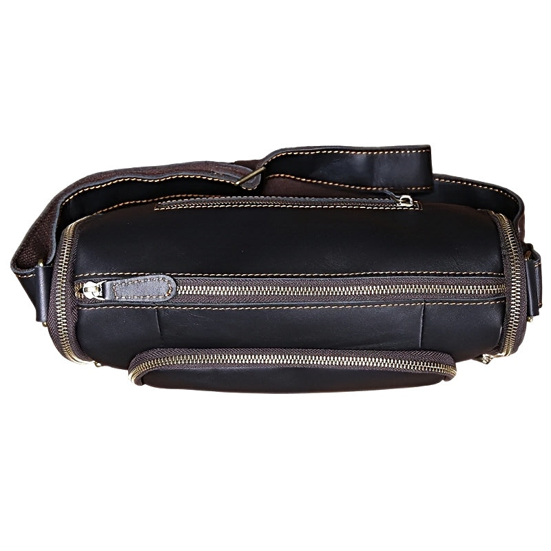 Black mens leather crossbody messenger bag metroline leather messenger with multiple zip pockets top view