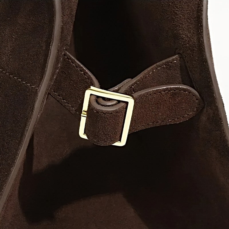 Close-up of a modern grace tote in brown leather nubuck womens handbag with a gold buckle