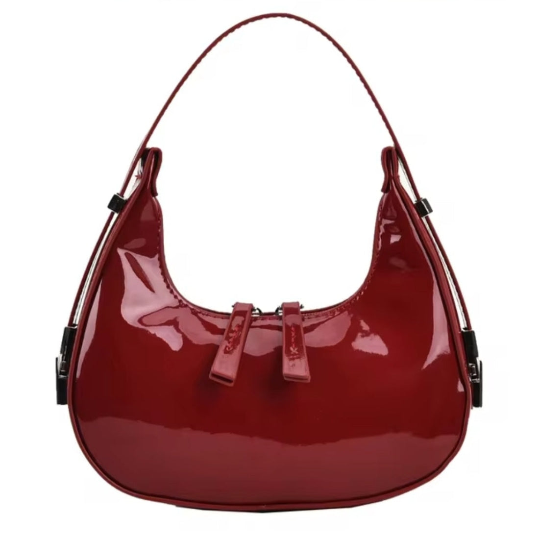 Luna Curve Carry luxury bag in glossy red vegan leather with crescent silhouette single shoulder strap and dual front bow accents silver hardware showcasing bold feminine styling polished premium finish and compact everyday elegance