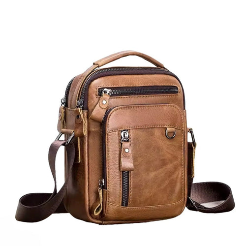 Timeless Axis Crossbody mens genuine leather bag in brown with double zip compartments front pocket and rugged upscale design shown upright