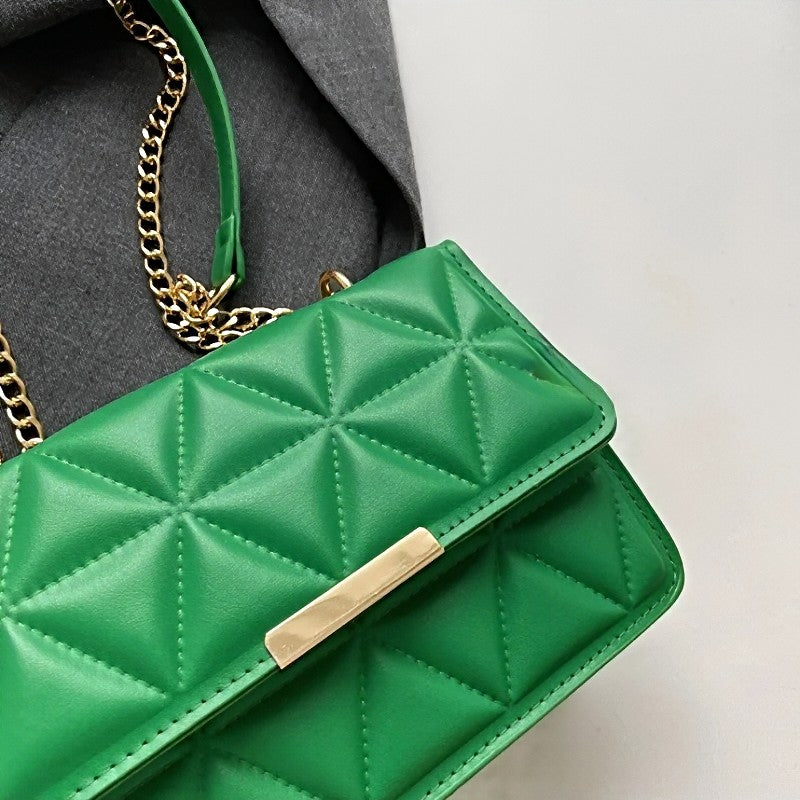 Timeless Chain Crossbody women's green quilted vegan leather chain crossbody bag on gray fabric