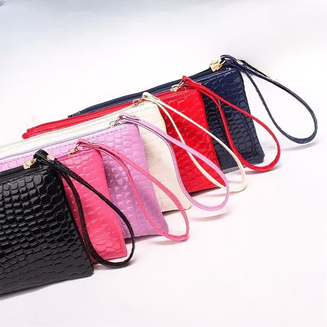 black blue beige hot pink pink and red timeless croc wristlets vegan leather bags croc wristlets that fit in a leather tote bag