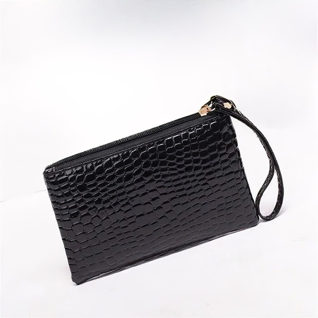 black timeless croc wristlet vegan leather clutch bag pairs with a leather tote bag