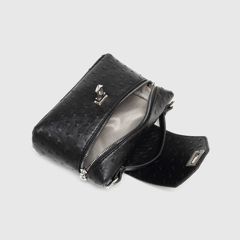 Timeless Petite Luxe women's black vegan leather crossbody bag with textured finish and zip closure