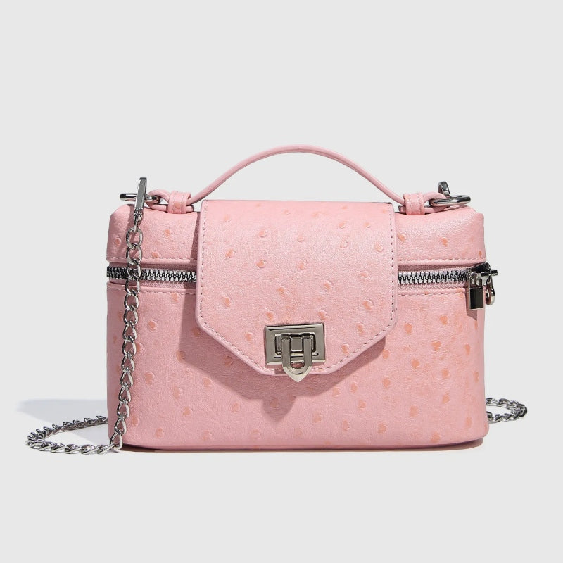 Timeless Petite Luxe women’s crossbody bag in pink textured vegan leather with chain strap