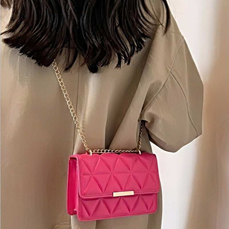 Timeless Chain Crossbody women's pink quilted crossbody bag with gold chain strap, vegan leather