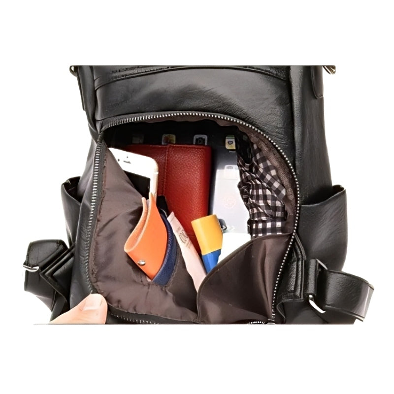 Urban Ease Backpack, women's backpack in black vegan leather, open to show organized interior with phone, wallet, and accessories