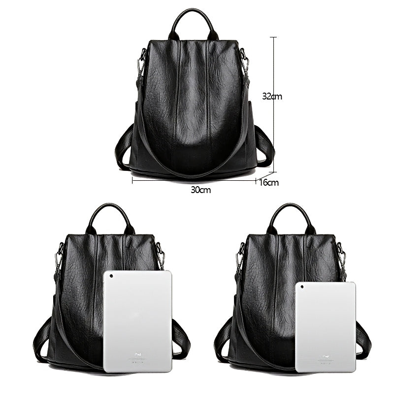 Urban Ease Backpack, women's black vegan leather, top handle and shoulder straps, size comparison with tablet, measurements 32cm x 30cm x 16cm