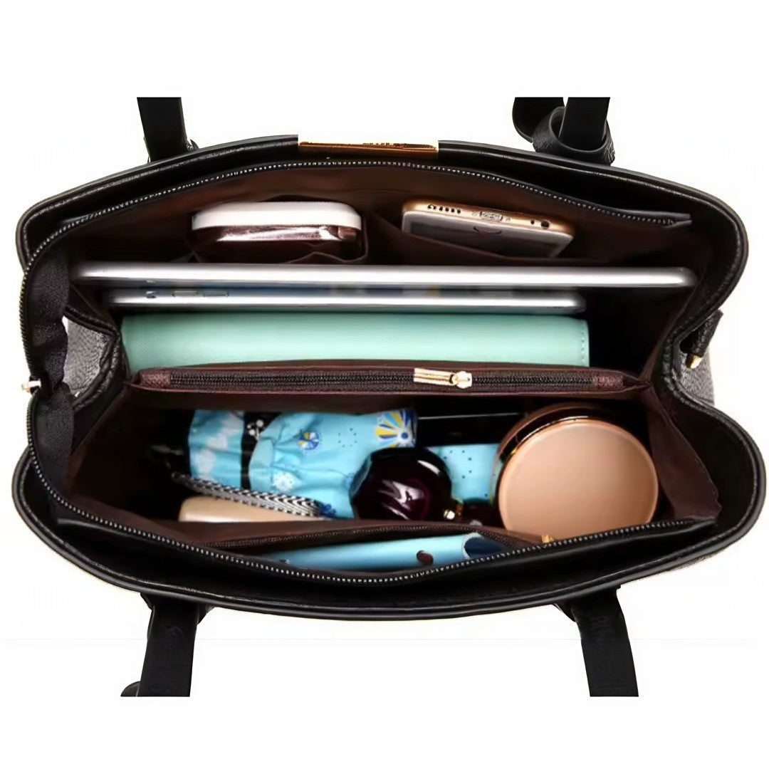 Urban Elegance Satchel in black vegan luxury leather shown open from top view with neatly organized contents showcasing spacious interior refined compartmentalization and premium construction for elevated elegant everyday carry