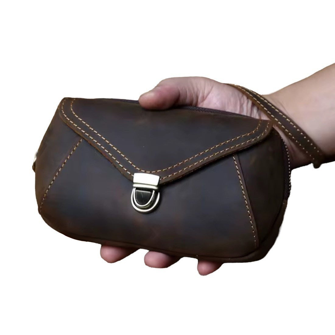 Heritage Utility Carry in dark brown genuine crazy horse leather with distressed luxury oil wax finish compact structured silhouette with triangular flap antique brass clasp and wrist showcasing vintage charm and upscale craftsmanship