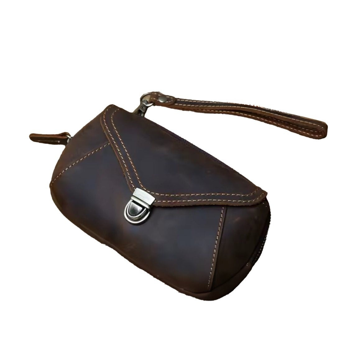 Heritage Utility Carry in dark brown genuine crazy horse leather with distressed luxury oil wax finish compact structured silhouette with triangular flap antique brass clasp and wrist showcasing vintage charm and upscale craftsmanship
