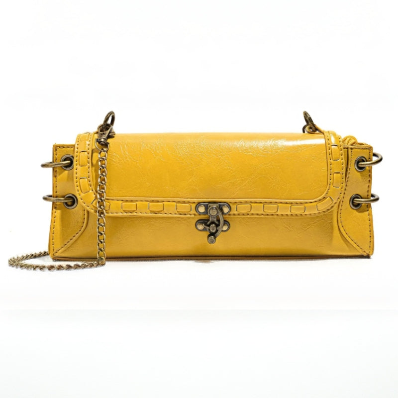 Luxe Chain Carry women's yellow vegan leather clutch bag with brass chain strap and clasp and hardware