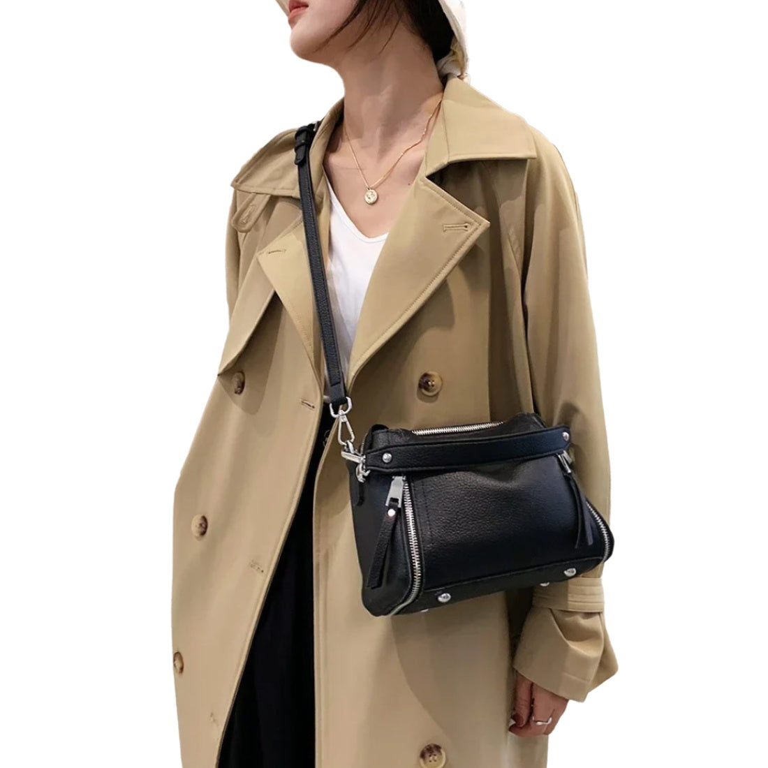 Timeless Zip Carry bag in black premium genuine leather with upscale silver hardware worn crossbodyshowcasing elegant everyday utility and upscale styling
